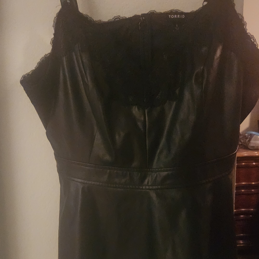 Torrid Faux Leather Peplum Top with Lace Detail. Size 1. Like New